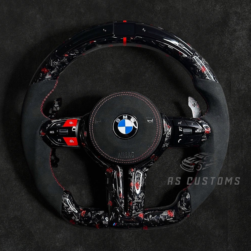 RS Customs BMW F-Series custom steering wheel with forged carbon fiber, customizable colored flakes, Alcantara grips, integrated LED display, optional heating and paddle shifters.
