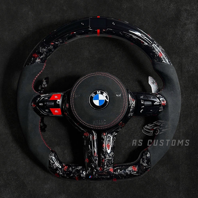 RS Customs BMW F-Series custom steering wheel with forged carbon fiber, customizable colored flakes, Alcantara grips, integrated LED display, optional heating and paddle shifters.