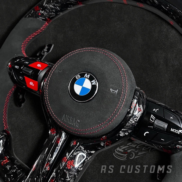 RS Customs BMW F-Series custom steering wheel with forged carbon fiber, customizable colored flakes, Alcantara grips, integrated LED display, optional heating and paddle shifters.