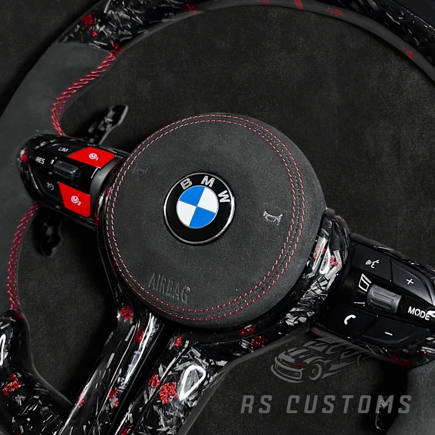 RS Customs BMW F-Series custom steering wheel with forged carbon fiber, customizable colored flakes, Alcantara grips, integrated LED display, optional heating and paddle shifters.