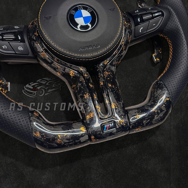 RS Customs BMW F-Series custom steering wheel with forged carbon fiber, customizable colored flakes, perforated leather grips, integrated LED display, optional complete airbag, heating and paddle shifters.