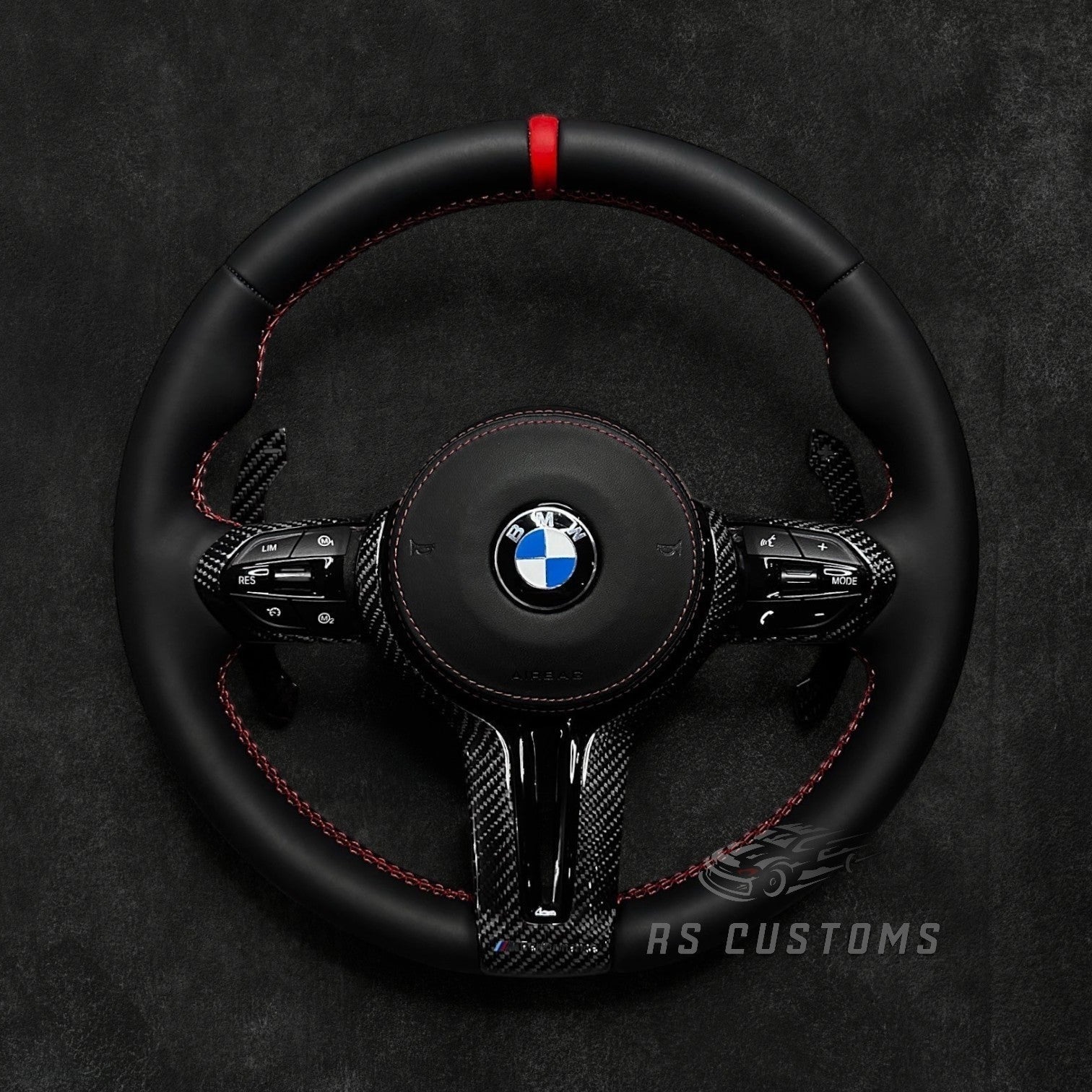 RS Customs BMW F-Series custom steering wheel with premium Nappa leather, carbon fiber trim, optional heating, paddle shifters and OEM functionality for BMW F-Series models.
