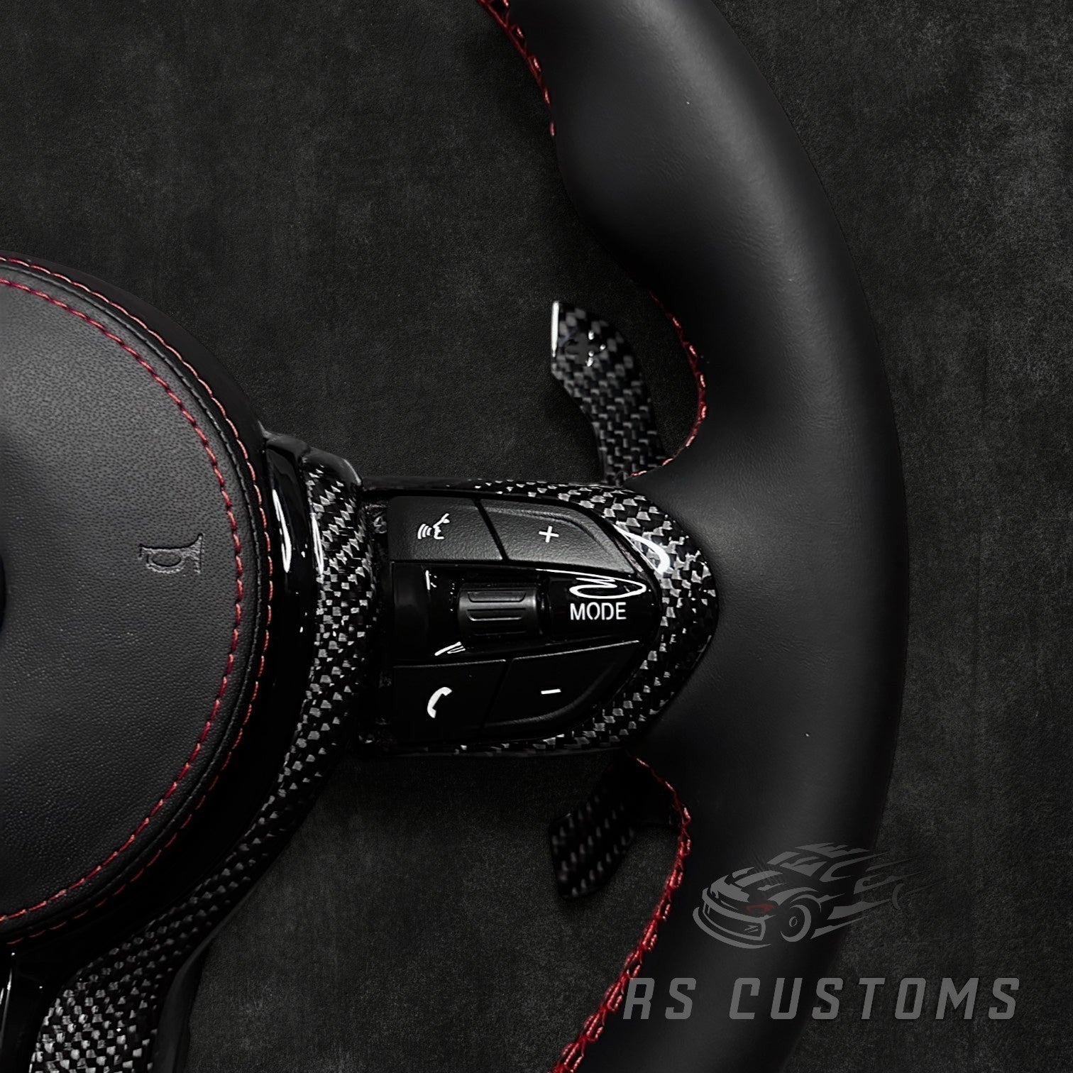 RS Customs BMW F-Series custom steering wheel with premium Nappa leather, carbon fiber trim, optional heating, paddle shifters and OEM functionality for BMW F-Series models.