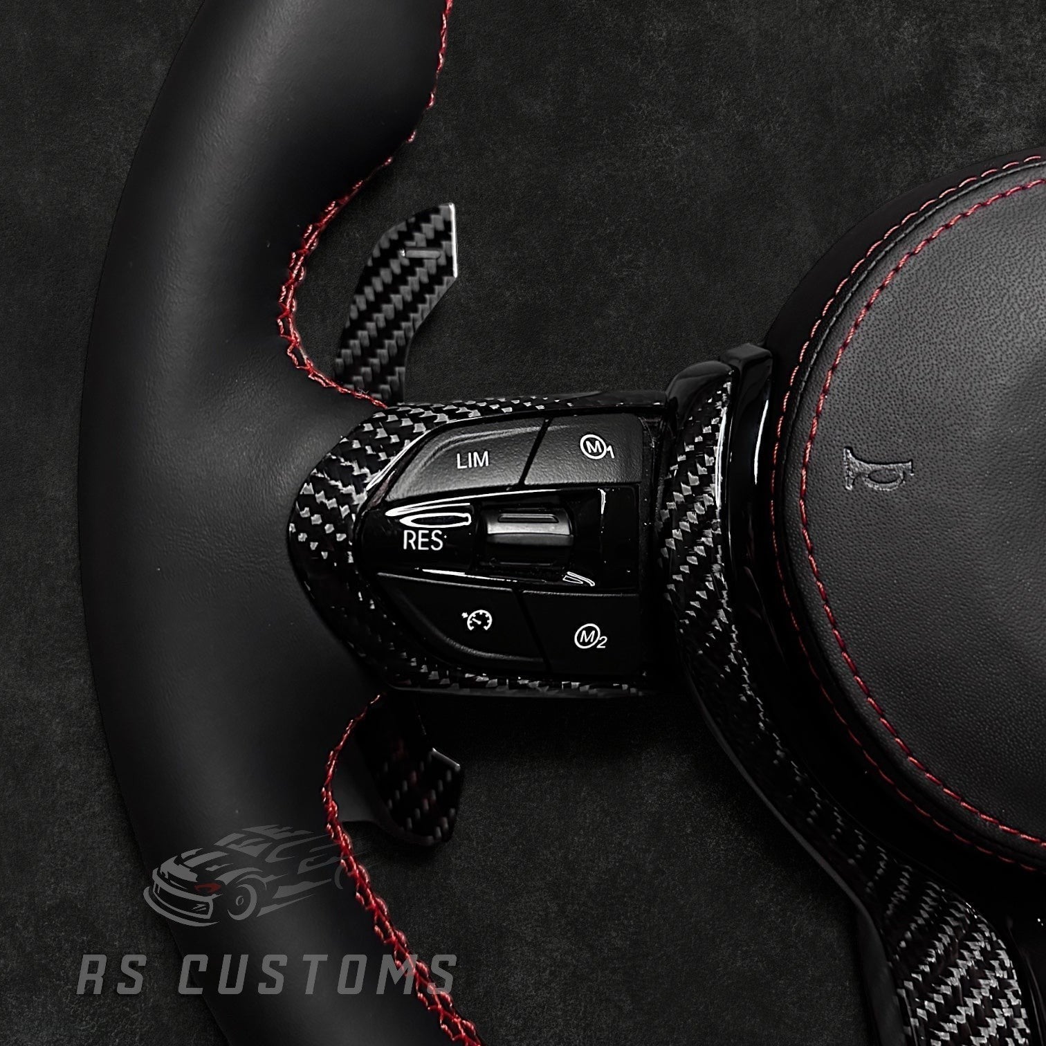 RS Customs BMW F-Series custom steering wheel with premium Nappa leather, carbon fiber trim, optional heating, paddle shifters and OEM functionality for BMW F-Series models.