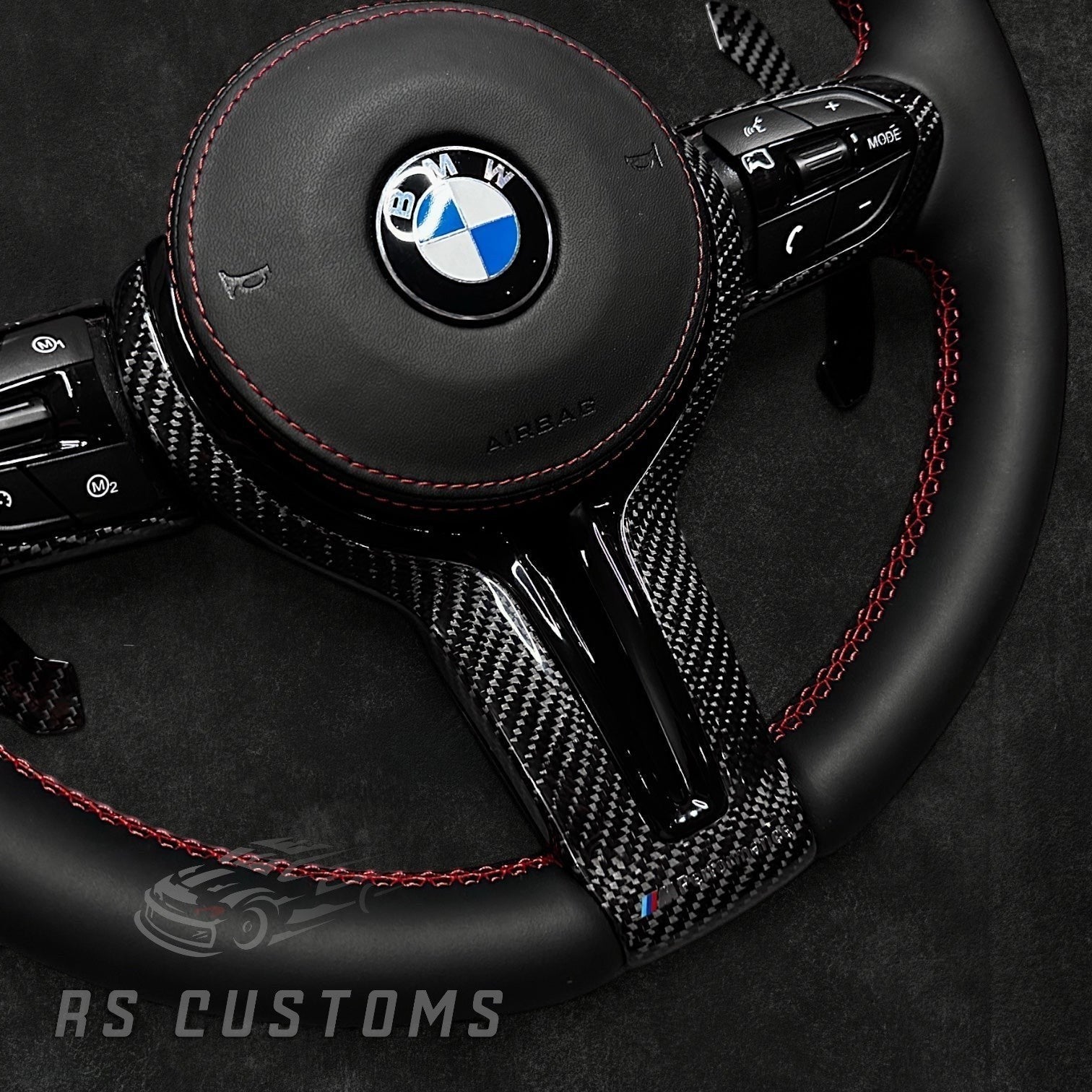 RS Customs BMW F-Series custom steering wheel with premium Nappa leather, carbon fiber trim, optional heating, paddle shifters and OEM functionality for BMW F-Series models.