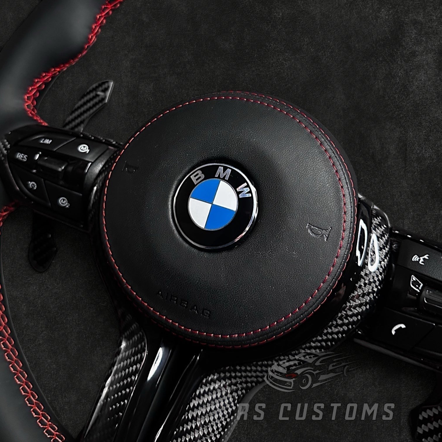 RS Customs BMW F-Series custom steering wheel with premium Nappa leather, carbon fiber trim, optional heating, paddle shifters and OEM functionality for BMW F-Series models.