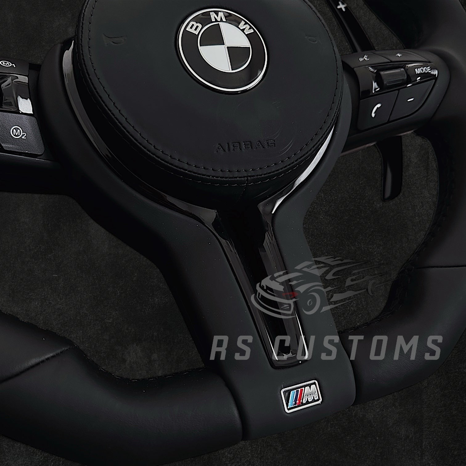 RS Customs BMW F-Series flat bottom leather steering wheel with black trim, heating, vibration support, paddle shifters and optional OEM or custom airbag.