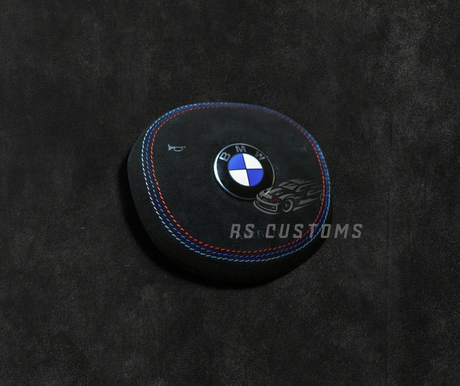 RS Customs BMW G-Series custom airbag cover for G20, G80, G82, G05, G07, G90 and other BMW G-Series models with leather, Alcantara, custom stitching and carbon fiber options.