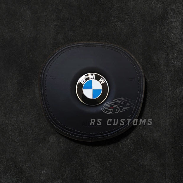 RS Customs BMW G-Series custom airbag cover for G20, G80, G82, G05, G07, G90 and other BMW G-Series models with leather, Alcantara, custom stitching and carbon fiber options.