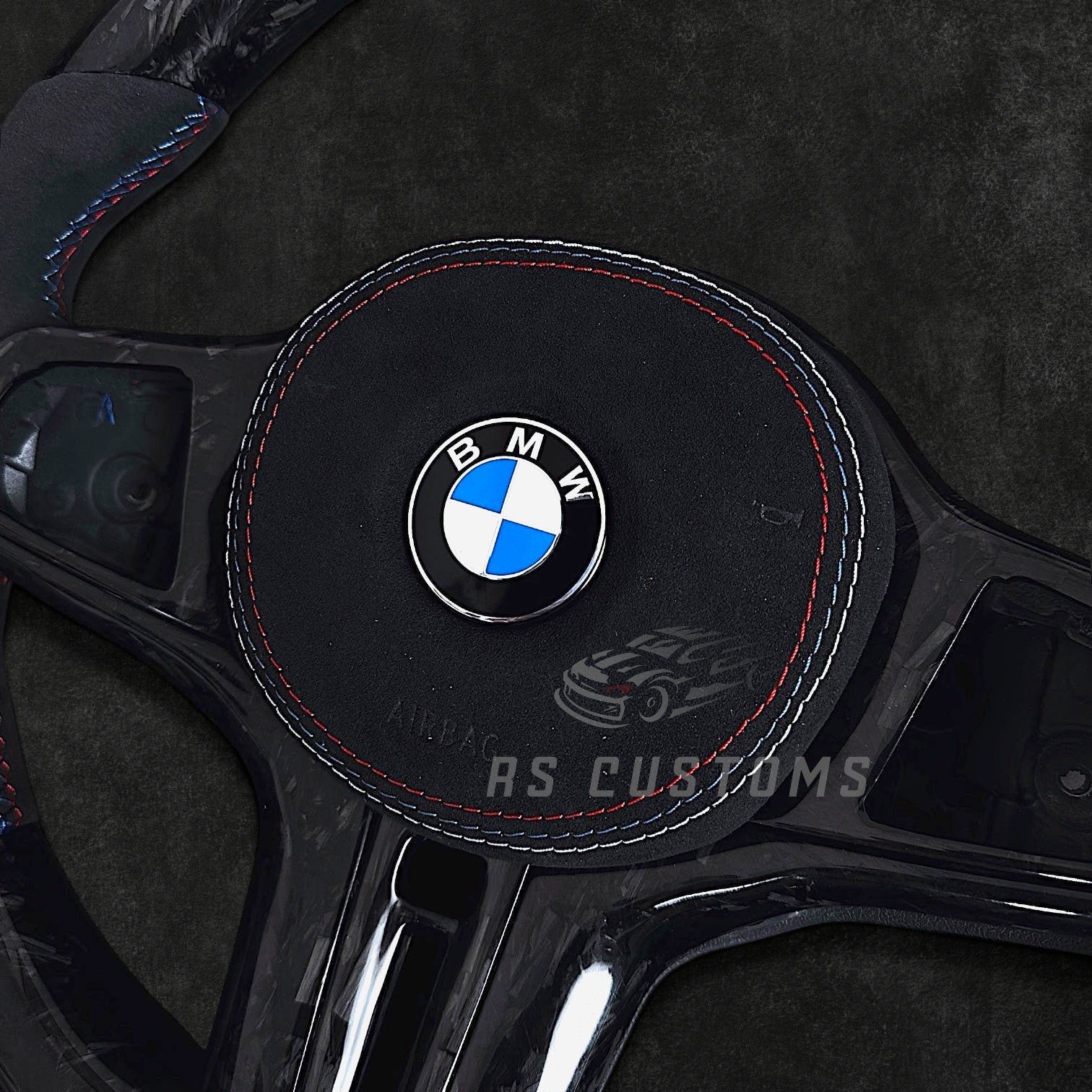 RS Customs BMW G-Series custom steering wheel with forged carbon fiber, Alcantara grips, forged carbon trim, heating, ACC, HOD sensor, vibration motor, paddle shifters and optional custom airbag.