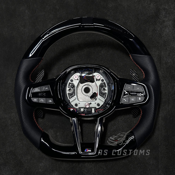 RS Customs BMW G-Series custom steering wheel with Piano Black trim, perforated leather grips, LED display, heating, ACC support, HOD sensor, vibration motor, paddle shifters and optional custom airbag.