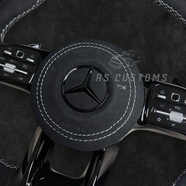 RS Customs Mercedes-AMG custom steering wheel with full Alcantara finish, chrome delete trim, multifunction buttons and optional complete airbag assembly for Mercedes-Benz models from 2014+.