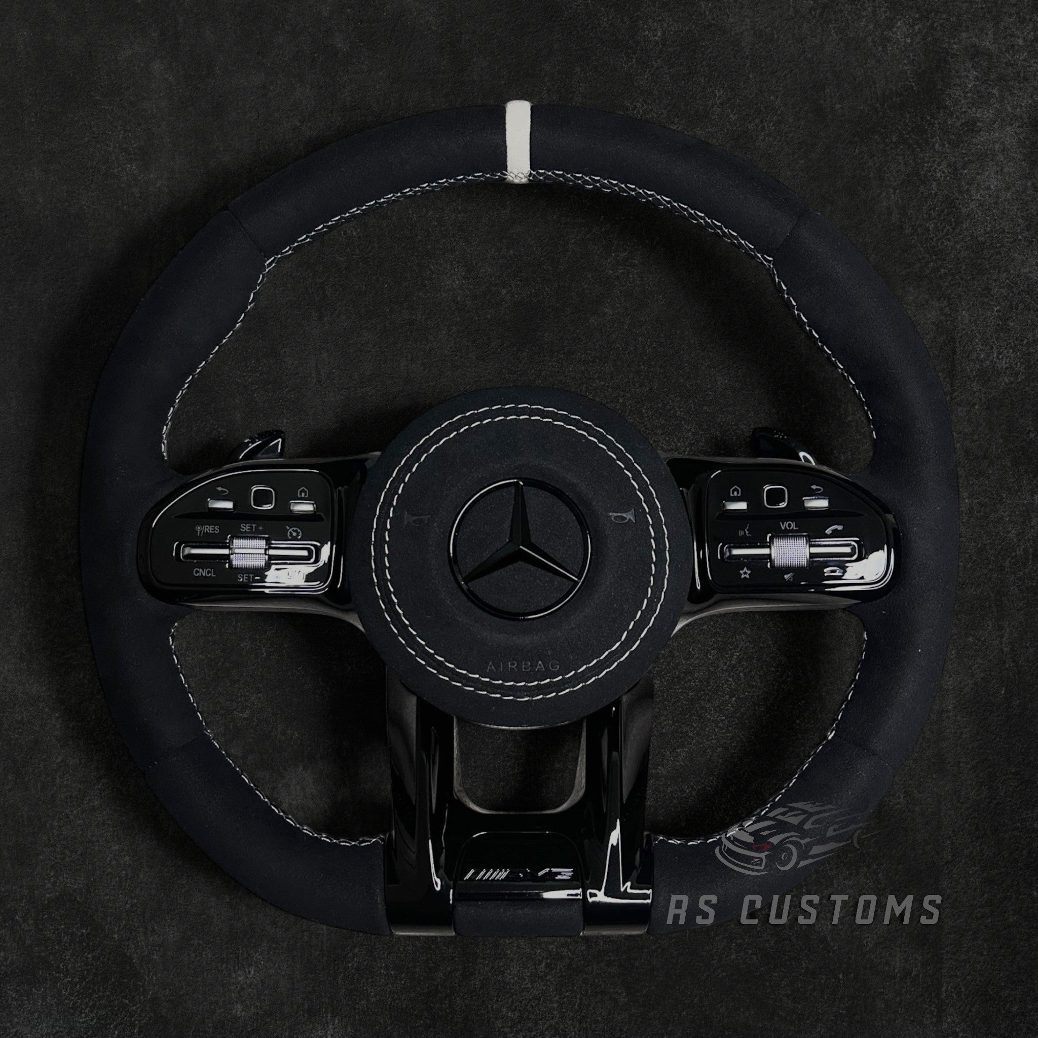 RS Customs Mercedes-AMG custom steering wheel with full Alcantara finish, chrome delete trim, multifunction buttons and optional complete airbag assembly for Mercedes-Benz models from 2014+.
