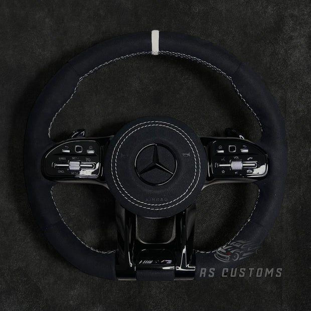 RS Customs Mercedes-AMG custom steering wheel with full Alcantara finish, chrome delete trim, multifunction buttons and optional complete airbag assembly for Mercedes-Benz models from 2014+.