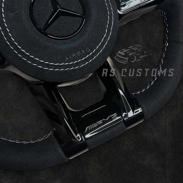 RS Customs Mercedes-AMG custom steering wheel with full Alcantara finish, chrome delete trim, multifunction buttons and optional complete airbag assembly for Mercedes-Benz models from 2014+.