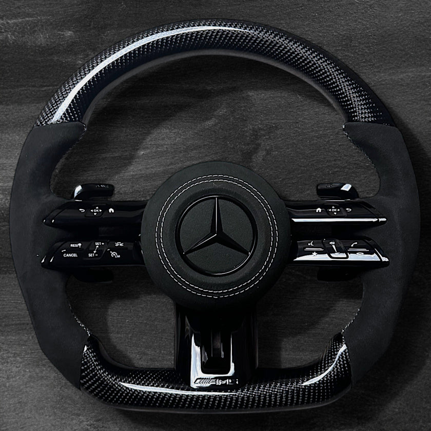 RS Customs Mercedes-AMG Dragonfly custom steering wheel with carbon fiber, Alcantara grips, multifunction buttons, optional complete airbag assembly and OEM functionality for Mercedes-Benz models from 2014+.