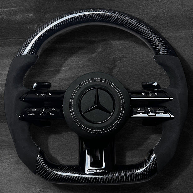 RS Customs Mercedes-AMG Dragonfly custom steering wheel with carbon fiber, Alcantara grips, multifunction buttons, optional complete airbag assembly and OEM functionality for Mercedes-Benz models from 2014+.