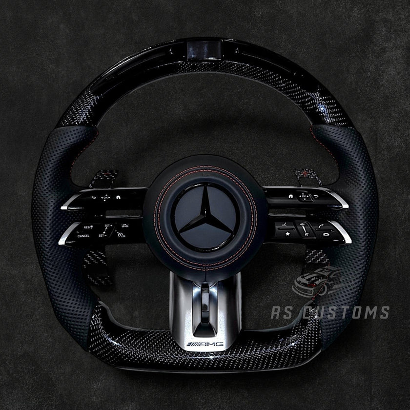 RS Customs Mercedes-AMG Dragonfly custom steering wheel with carbon fiber, perforated leather grips, LED display, multifunction buttons and optional full airbag for Mercedes-Benz models from 2014+.