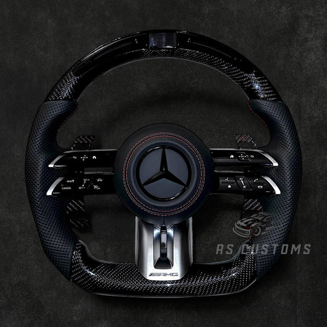 RS Customs Mercedes-AMG Dragonfly custom steering wheel with carbon fiber, perforated leather grips, LED display, multifunction buttons and optional full airbag for Mercedes-Benz models from 2014+.