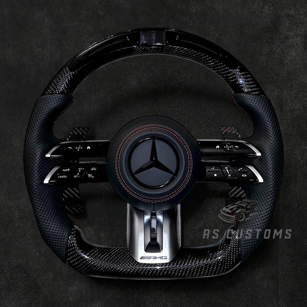 RS Customs Mercedes-AMG Dragonfly custom steering wheel with carbon fiber, perforated leather grips, LED display, multifunction buttons and optional full airbag for Mercedes-Benz models from 2014+.