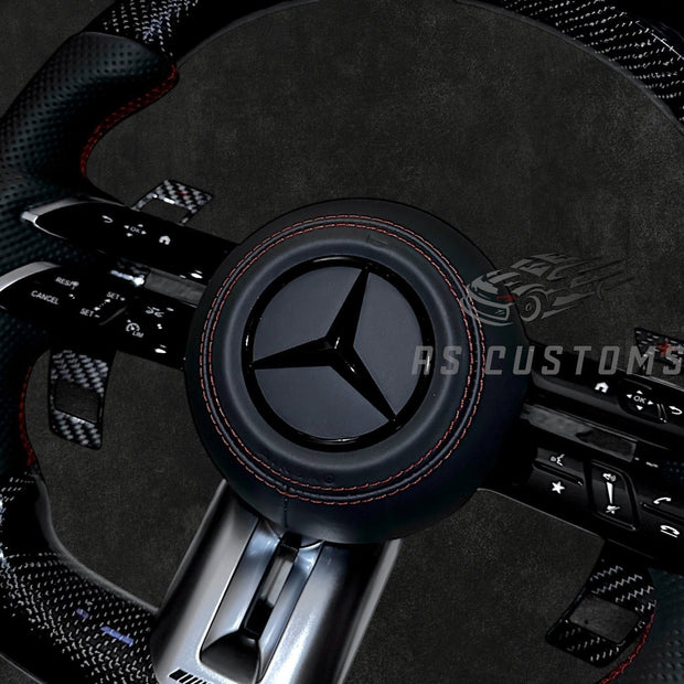 RS Customs Mercedes-AMG Dragonfly custom steering wheel with carbon fiber, perforated leather grips, LED display, multifunction buttons and optional full airbag for Mercedes-Benz models from 2014+.