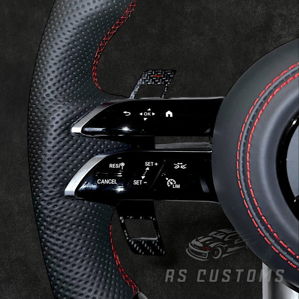 RS Customs Mercedes-AMG Dragonfly custom steering wheel with carbon fiber, perforated leather grips, LED display, multifunction buttons and optional full airbag for Mercedes-Benz models from 2014+.