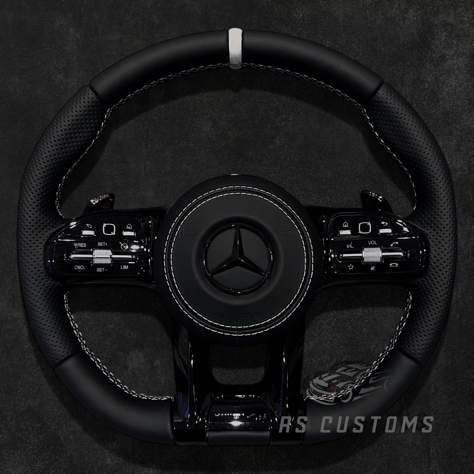 RS Customs Mercedes-Benz AMG Gen 4 custom steering wheel with full leather all-black design and leather airbag cover for W204, W205, W206, W212, W213, W222, W223, W463 and most Mercedes-Benz models from 2012+.