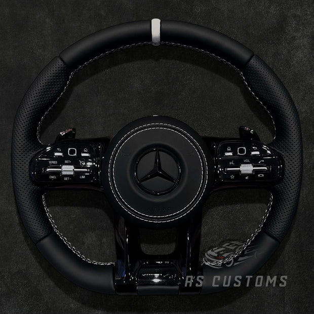 RS Customs Mercedes-Benz AMG Gen 4 custom steering wheel with full leather all-black design and leather airbag cover for W204, W205, W206, W212, W213, W222, W223, W463 and most Mercedes-Benz models from 2012+.
