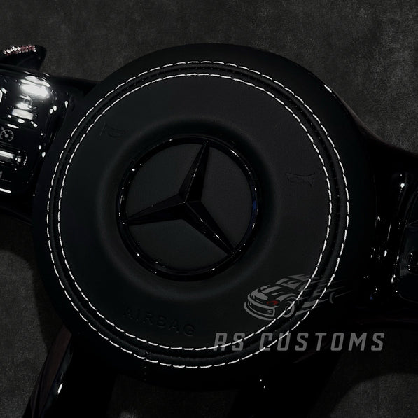 RS Customs Mercedes-Benz AMG Gen 4 custom steering wheel with full leather all-black design and leather airbag cover for W204, W205, W206, W212, W213, W222, W223, W463 and most Mercedes-Benz models from 2012+.