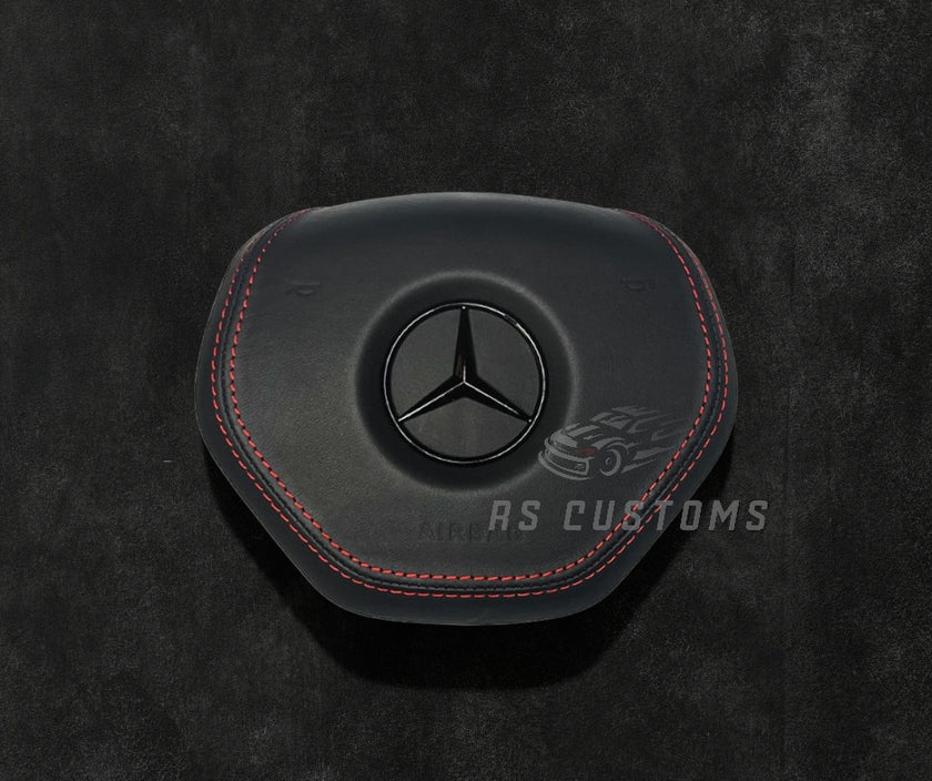 RS Customs Mercedes-Benz custom airbag cover for W204, W212, W221, W166, X166 and other 2011–2015 Mercedes-Benz models with leather, Alcantara and custom stitching options.