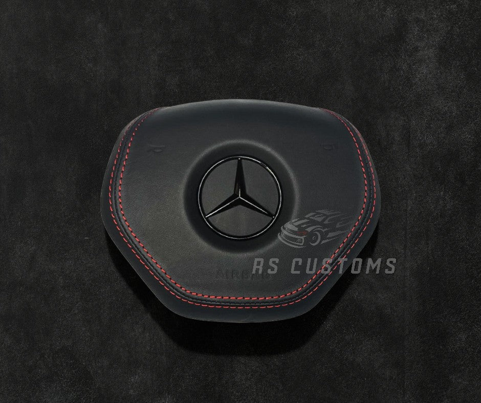 RS Customs Mercedes-Benz custom airbag cover for W204, W212, W221, W166, X166 and other 2011–2015 Mercedes-Benz models with leather, Alcantara and custom stitching options.