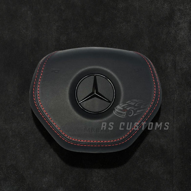 RS Customs Mercedes-Benz custom airbag cover for W204, W212, W221, W166, X166 and other 2011–2015 Mercedes-Benz models with leather, Alcantara and custom stitching options.
