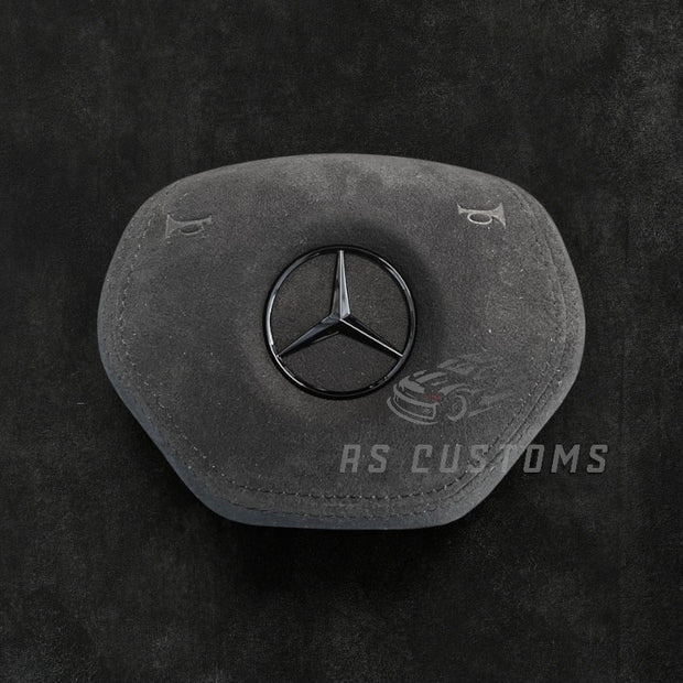 RS Customs Mercedes-Benz custom airbag cover for W204, W212, W221, W166, X166 and other 2011–2015 Mercedes-Benz models with leather, Alcantara and custom stitching options.