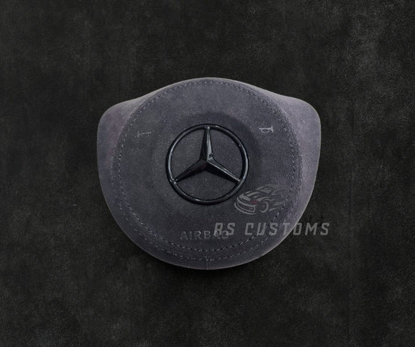 RS Customs Mercedes-Benz custom airbag cover for 2016–2018 models available in leather or Alcantara with custom stitching and chrome or black Mercedes-Benz logo options.