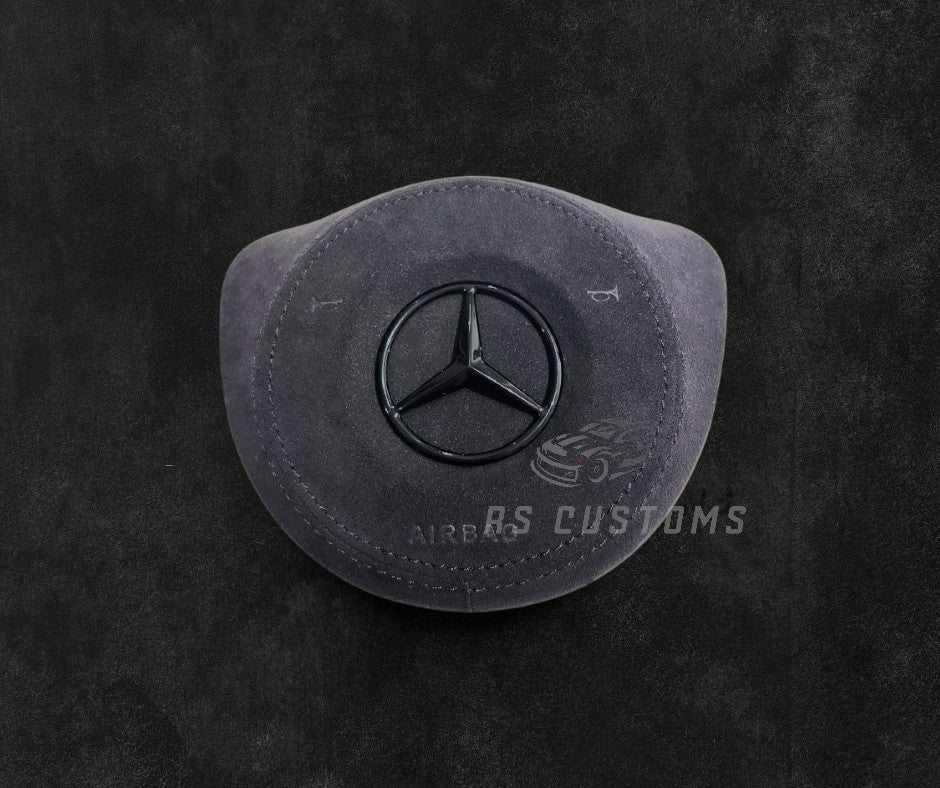 RS Customs Mercedes-Benz custom airbag cover for 2016–2018 models available in leather or Alcantara with custom stitching and chrome or black Mercedes-Benz logo options.