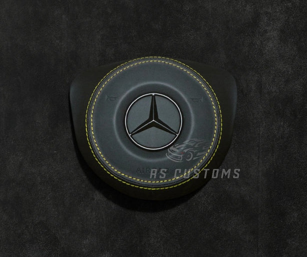 Custom MercedesRS Customs Mercedes-Benz custom airbag cover for 2016–2018 models available in leather or Alcantara with custom stitching and chrome or black Mercedes-Benz logo options.Airbag 2016 2018