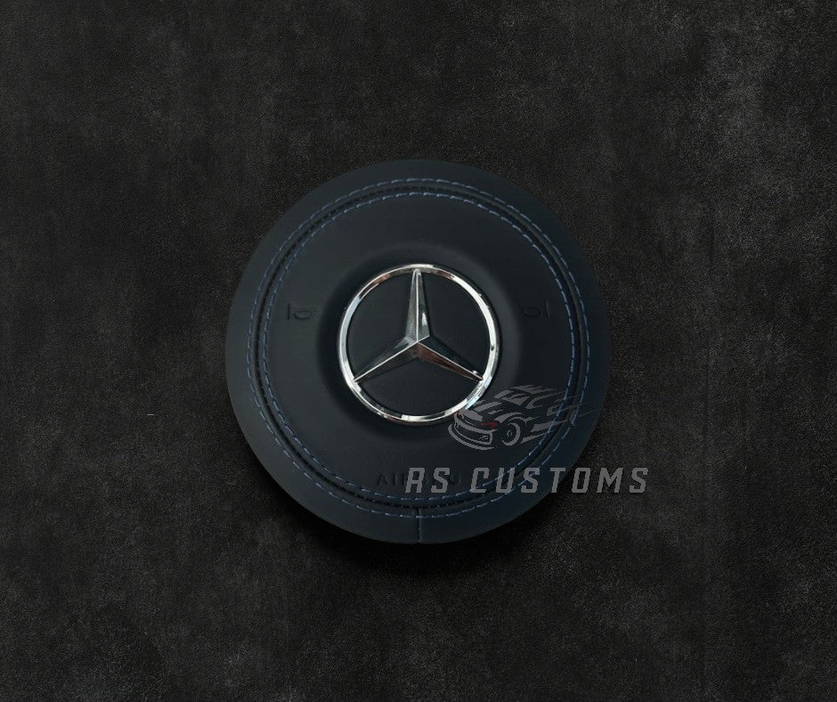 RS Customs Mercedes-Benz custom airbag cover for 2018–2022 models available in leather or Alcantara with custom stitching and chrome or black Mercedes-Benz logo options.