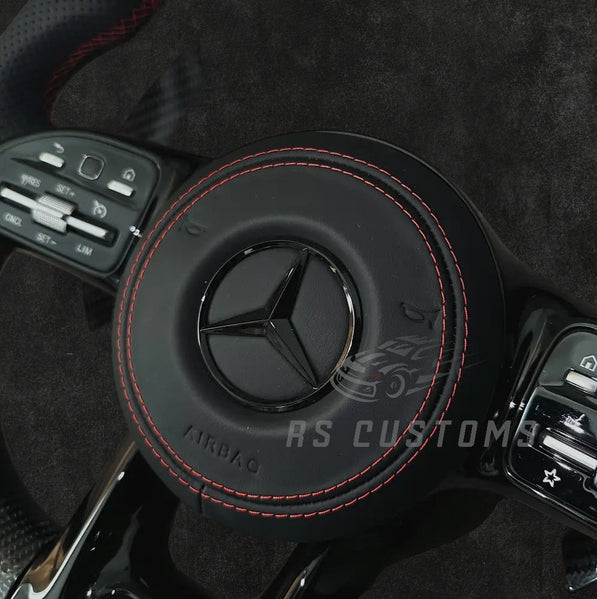 RS Customs Mercedes-Benz custom airbag cover for 2018–2022 models available in leather or Alcantara with custom stitching and chrome or black Mercedes-Benz logo options.