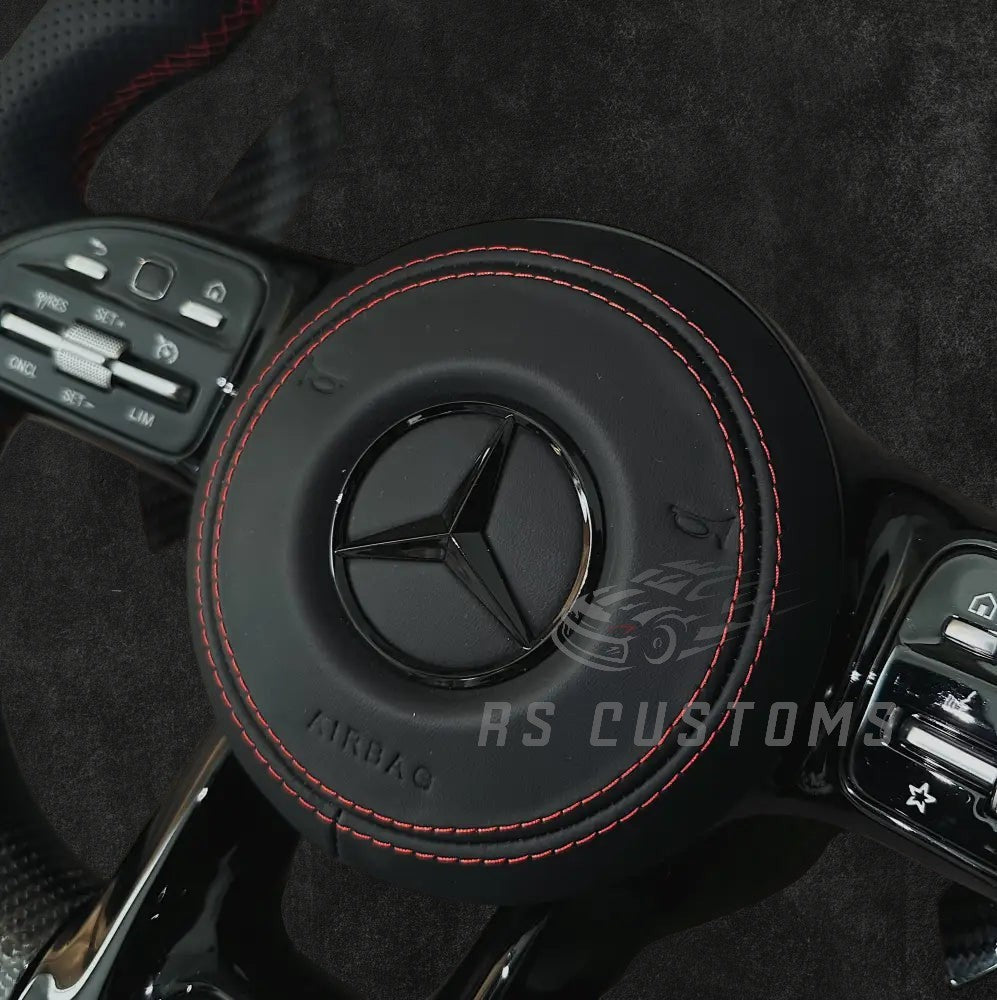 RS Customs Mercedes-Benz custom airbag cover for 2018–2022 models available in leather or Alcantara with custom stitching and chrome or black Mercedes-Benz logo options.
