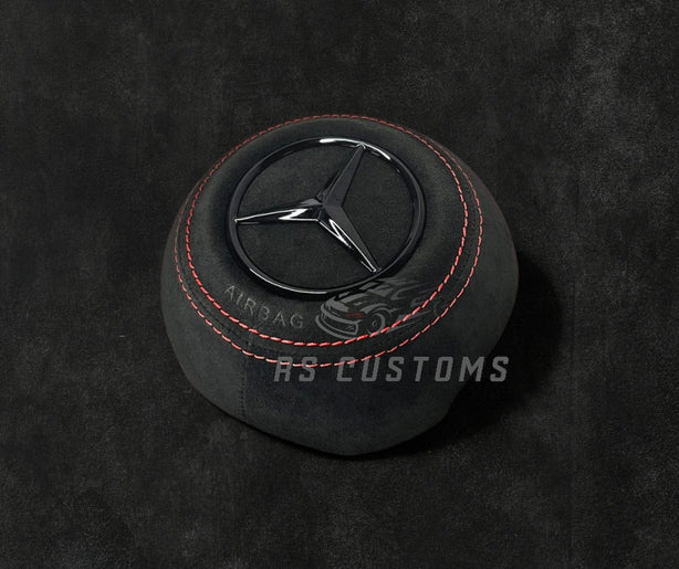 RS Customs Mercedes-Benz custom airbag cover for 2022+ models available in leather or Alcantara with custom stitching and chrome or black Mercedes-Benz logo options.