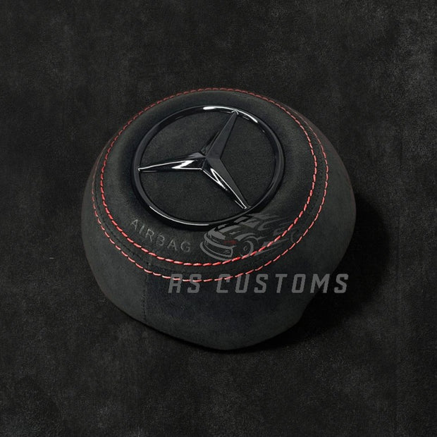 RS Customs Mercedes-Benz custom airbag cover for 2022+ models available in leather or Alcantara with custom stitching and chrome or black Mercedes-Benz logo options.