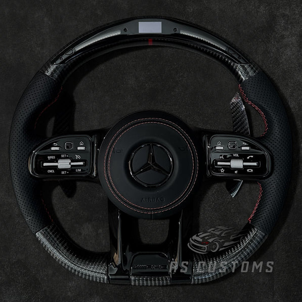 RS Customs Mercedes W205 W213 W222 W463A AMG custom steering wheel with carbon fiber, perforated leather grips and LED display for C-Class, E-Class, S-Class and G-Class models.