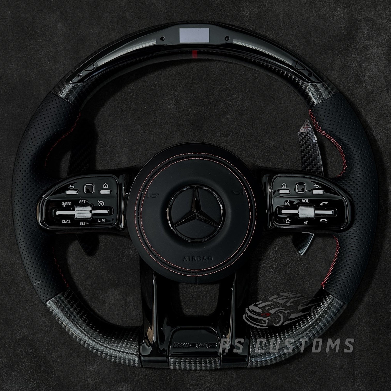 RS Customs Mercedes W205 W213 W222 W463A AMG custom steering wheel with carbon fiber, perforated leather grips and LED display for C-Class, E-Class, S-Class and G-Class models.