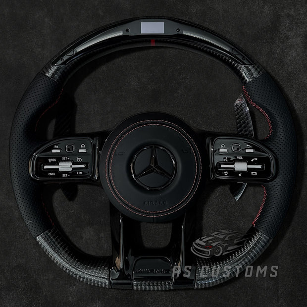 RS Customs Mercedes W205 W213 W222 W463A AMG custom steering wheel with carbon fiber, perforated leather grips and LED display for C-Class, E-Class, S-Class and G-Class models.
