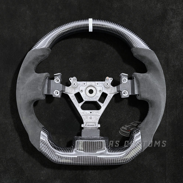 RS Customs Nissan 350Z custom steering wheel with carbon fiber, Alcantara grips, optional carbon trim cover and custom leather or Alcantara airbag cover for Z33 models.