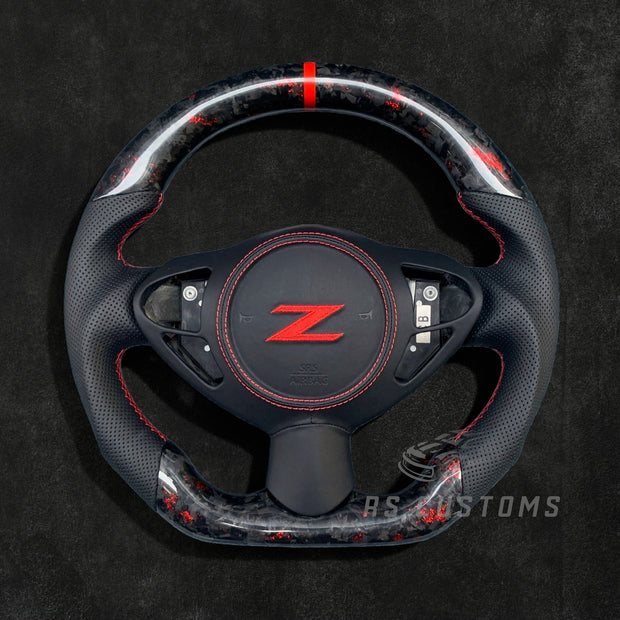 RS Customs Nissan 370Z custom steering wheel with forged carbon fiber, colored flakes, leather grips and optional custom airbag cover for Z34 models