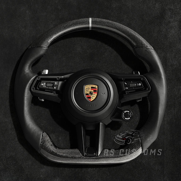 RS Customs Porsche 911 992.1 custom steering wheel with plain weave carbon fiber, Nappa leather, multifunction buttons, paddle shifters and optional custom airbag for Carrera, GTS, Turbo and GT3 models.