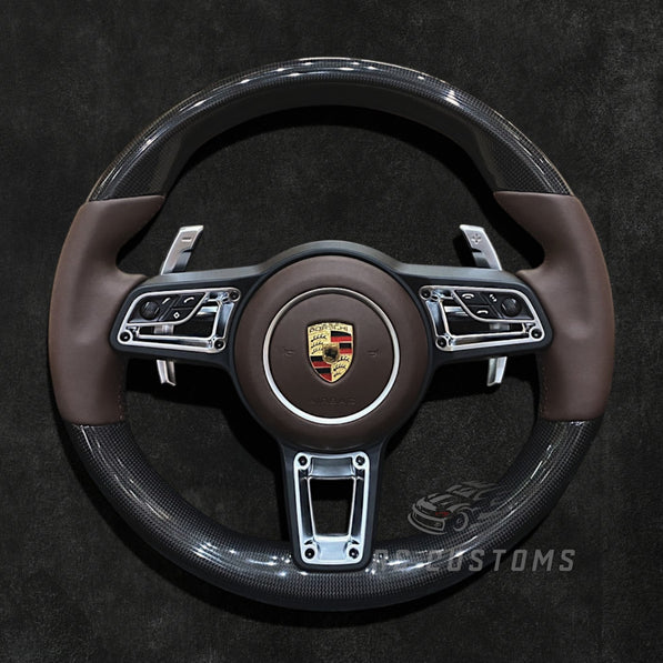 RS Customs Porsche custom steering wheel with plain weave carbon fiber, Nappa leather, multifunction buttons and optional custom airbag for 911, Cayman, Boxster, Macan, Cayenne and Panamera models.