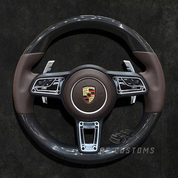RS Customs Porsche custom steering wheel with plain weave carbon fiber, Nappa leather, multifunction buttons and optional custom airbag for 911, Cayman, Boxster, Macan, Cayenne and Panamera models.