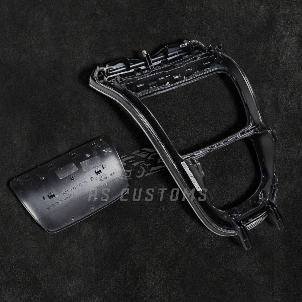 RS CUSTOMS genuine carbon fiber center console trim panel with high-gloss finish and sporty aesthetic.
